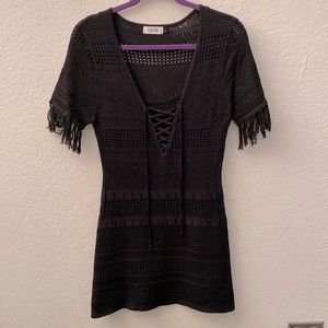 Never worn black crochet stretchy dress. Size large. Brand is Lilyful.